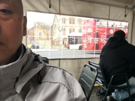 200 The man behind is maybe a drug dealer. A person came and received a small bag